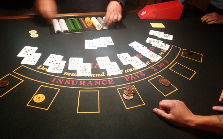 Dealer at a live card table